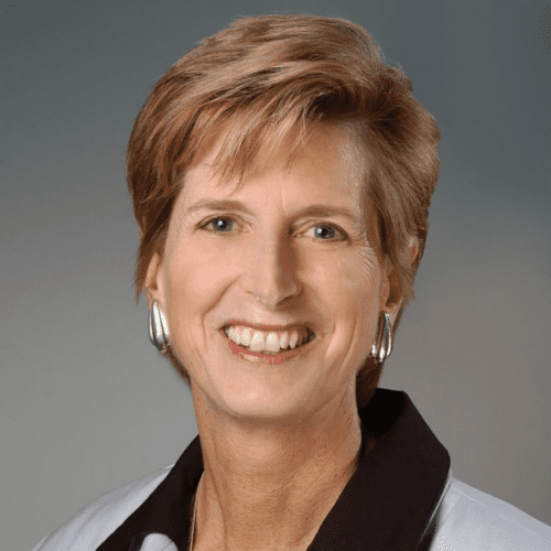 Christine Todd Whitman, short blonde hair with a black and gray shirt