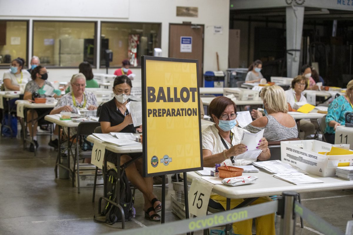 Election workers process ballots (and signatures verified) at vote centers across the state during the California Gubernatorial Recall Election, including the Orange County Registrar of Voters in Santa Ana Thursday, Sept. 9, 2021. (Allen J. Schaben / Los Angeles Times via Getty Images)